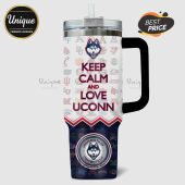 White handled tumbler with UCONN Huskies logos and 'Keep Calm and Love UCONN' text over multiple other college logos.!