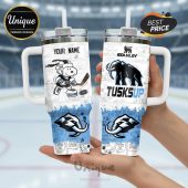 Two white tumblers with handles, featuring a Peanuts hockey theme and Tuskup graphics!