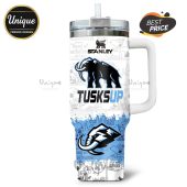 Stanley tumbler featuring a cartoon pattern and a TUSKS UP graphic with an elephant logo.!