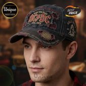 Distressed black denim AC/DC cap, vintage rock band style with 'HIGH VOLTAGE AC/DC EST. 1973' patch and 'HELLS BELLS' graphic!