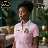 Pink polo shirt with AKA letters, crest, and custom 'YOUR NAME' text. Sorority style!