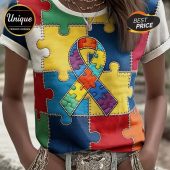 Vibrant multicolor patchwork puzzle piece shirt featuring an autism awareness ribbon design! Red, yellow, blue, green hues!