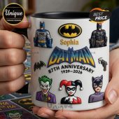 White mug with Batman characters, 'Sophia' text, 87th Anniversary 1939-2026! Black handle and interior!