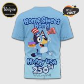 Light blue tee. Cartoon dog with USA flag/cake. Text: Home Sweet Home, Happy USA 250th!