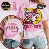 Pink tie-dye shirt with 'Hope for a Cure Buc-ee's' text and ribbon for Breast Cancer Awareness support! Trendy merch!
