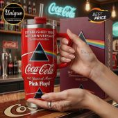 Red Coca-Cola mug with Pink Floyd prism art, text 'Established 1886', '140th Anniversary', '140 Years of Magic'.!