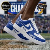 Duke Blue Devils shoes! White/blue, 'Duke', 'Champions' text, team logo. College sports style!