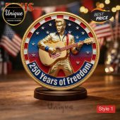 Elvis Coin: Gold Elvis with guitar, stars, stripes, and text '250 Years of Freedom' in blue, white, red! Retro design!