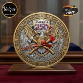 Gold USFA coin with eagle, axes, and fire truck design! Text: US Semiquincentennial, US Fire Administration, America 250!