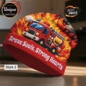 Red beanie with firetruck, flame background. Text: Brave Souls, Strong Hearts!