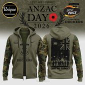 Olive green hoodie with camo sleeves, ANZAC Day 2026 graphic, Lest We Forget text and Fremantle Dockers logo.!