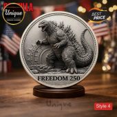 Detailed silver Godzilla coin, embossed relief, 