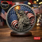 Metallic gray Godzilla Statue of Liberty coin, American flag background, bold red white blue. Text: 250 YEARS OF FREEDOM!