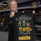 Black t-shirt with retro-style Green Bay Packers legends Favre, Starr, Rodgers design! NEVER UNDERESTIMATE A WOMAN WHO UNDERSTANDS FOOTBALL AND LOVES PACKERS!