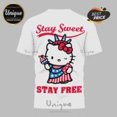 White tee with Hello Kitty Statue of Liberty design. Text: Stay Sweet, Stay Free!