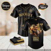 Black/gold jersey: Rockies, John Cena, 17-Time Champion. Back: Cena, GOAT, Saturday Night's Main Event, Cena's Final Match.!