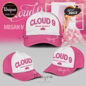 Pink and white cap with the words CLOUD 9 MEGAN MORONEY and a signature on the bill.!