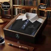 Mercedes-Benz logo polo shirt in a wooden box on a desk with a pen and inkwell.!
