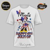 White tee with patriotic Minnie Mouse in red white blue flag dress, bow, yellow shoes! Features black MINNIE text, red white blue HAPPY 4TH JULY OF text, red and blue stars, and paint splatters!