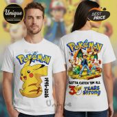 White Pokémon tee with Pikachu graphic, '1996-2026' text, & back print featuring Ash and other Pokémon characters!