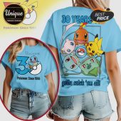 Blue tee with '30 Years' text and Pokemon art! Pikachu, Charmander, Mew, Squirtle, & Bulbasaur graphic!