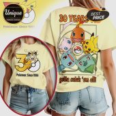 Yellow tees show retro Pokemon design! '30 Years' text and 'gotta catch 'em all!' slogan jumps out!