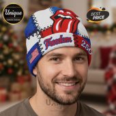 Man wears a beanie with a Rolling Stones tongue, US flag, 