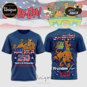 Blue Scooby-Doo shirt. Features 'America 250' text, USA flag & vintage cartoon graphics. Patriotic apparel!