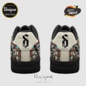 Custom kicks: Black sneakers show gothic '6' on cream heel. Sides feature dark, detailed vintage-style collage art!