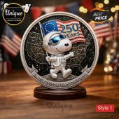 Coin shows Snoopy astronaut, US map, stars, and flag. Text: 250 YEARS, America 250: Our Story. Our Future.!