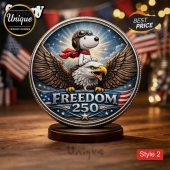 Snoopy rides eagle in this patriotic coin art! Reads 