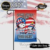 Red white blue patriotic garden flag featuring Snoopy and Woodstock in Uncle Sam hats! Text reads HOME SWEET HOME YOUR FAMILY July 4 1776-2026 250th!