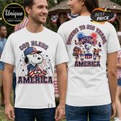 White tee with Snoopy & Peanuts gang. Text: God Bless America, Cheers To 250 Years. Patriotic design!