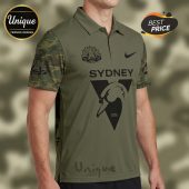 Olive polo shirt with camo sleeves, 'Sydney' text, swan graphic, and 'ANFAC' text/symbol!
