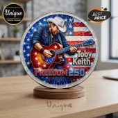 Patriotic red white blue country rock star design, cowboy with guitar, 'Toby Keith FREEDOM 250' text, commemorative coin!