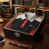 Black polo shirt with Toyota logo and red accents in a gift box! 