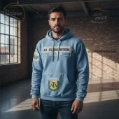 Light blue hoodie with white distressed patches, AFA - SELECCIÓN ARGENTINA 1893-2026 text, and Argentina crests!