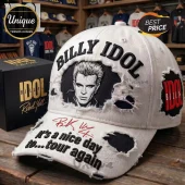 White distressed baseball cap with Billy Idol portrait! Black text reads 'BILLY IDOL' and 'it's a nice day to... tour again'!