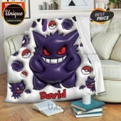 A white fleece blanket with a purple 3D Gengar, Poke Balls, and the personalized name David in red font!