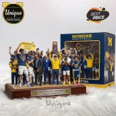 Michigan Basketball 2026 NCAA Champions figurine in blue and yellow with 'Go Blue' sign and trophy!