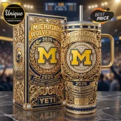 Ornate gold and blue Michigan Wolverines tumbler with M logo and text '2026 NCAA Men's Basketball National Champions'!