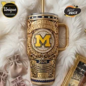 Gold and blue Michigan Wolverines tumbler with championship ring design, M logo, and text '2026 National Champions'!