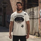 Distressed cream t-shirt with retro Penrith Panthers logo, black oval patch, white panther, EST. 1966 text!