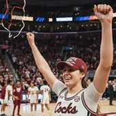 White college basketball jersey with maroon and black trim, SEC logo, Under Armour, 'Cocks' text. Maroon 'FINAL FOUR' baseball cap!