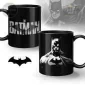 Black ceramic mug set with gritty white 'THE BATMAN' text logo and grayscale comic book Batman portrait! Dark superhero style!