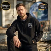 A black hoodie with the white upside-down house logo for the band The Neighbourhood on the left chest in a minimalist style!