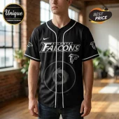Black Atlanta Falcons baseball jersey with white trim featuring Falcons logo and team text on chest!