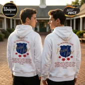 White hoodie with blue and gold crest logo and text El Nostre Cami Present i Futur on the back with small red stars!