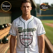 White baseball jersey with green trim and Mustangs script text featuring a 2026 Big West Baseball Championship logo shield!