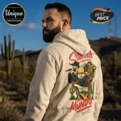 Cream hoodie with back graphic of Carin Leon, lion, desert landscape, and text Sonora Para El Mundo in vintage style!